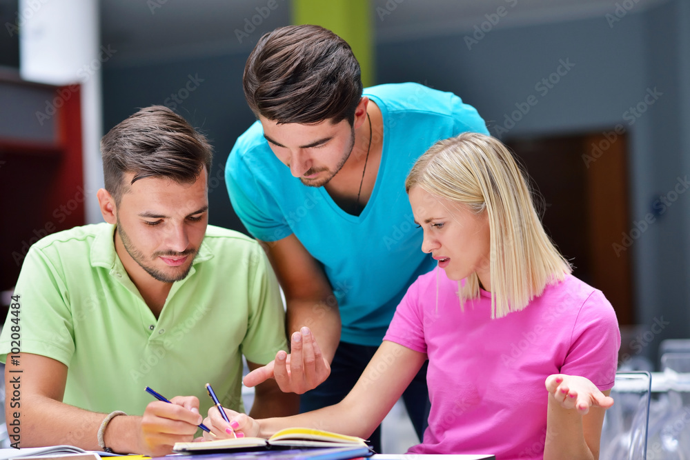 happy students group study in classroom happy students group study in classroom