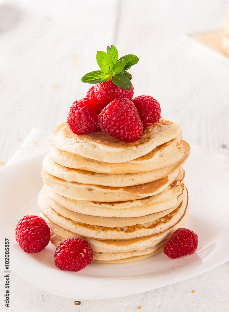 Stack of pancakes with fresh berries Stack of pancakes with fresh berries