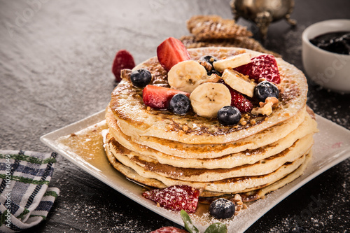 Stack of pancakes with fres...