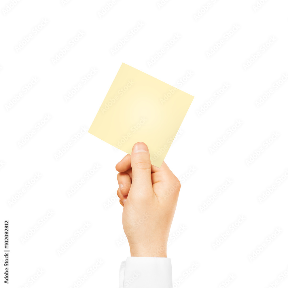 Hand holding square blank yellow sticker mock up isolated. Hand holding square blank yellow sticker mock up isolated.