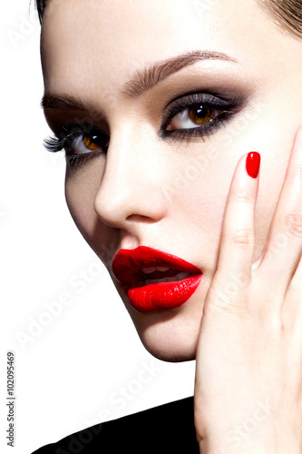 Beautiful young model with red lips. Gorgeous Woman Face.