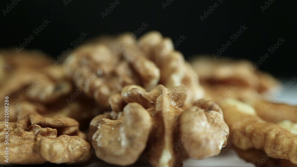 Kernels Rotate on The Table. Black Background. Close-up Kernels Rotate on The Table. Black Background. Close-up
