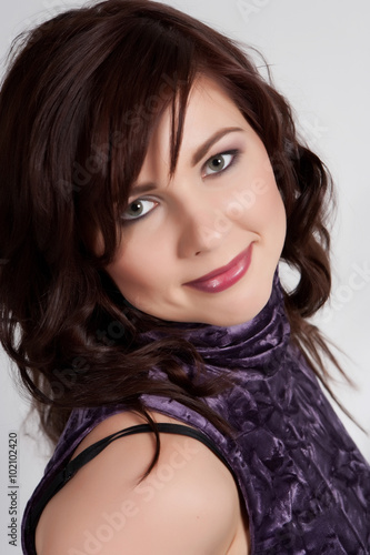Beautiful young lady in studio. Portrait.