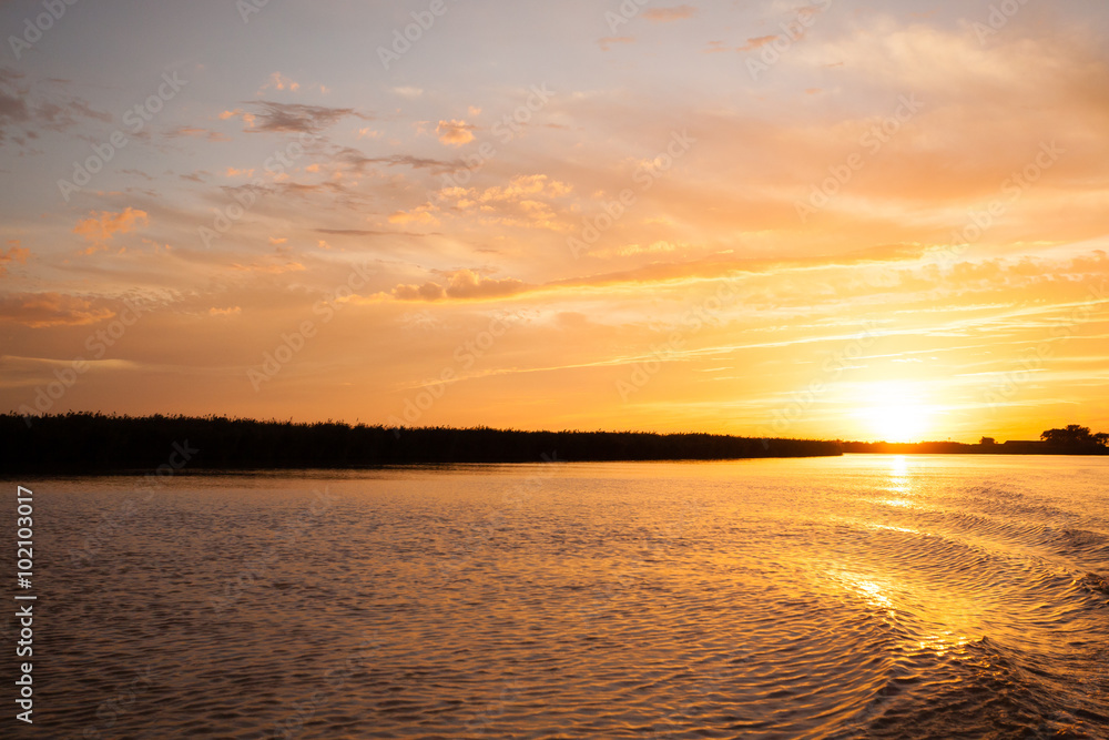 Sunset over water