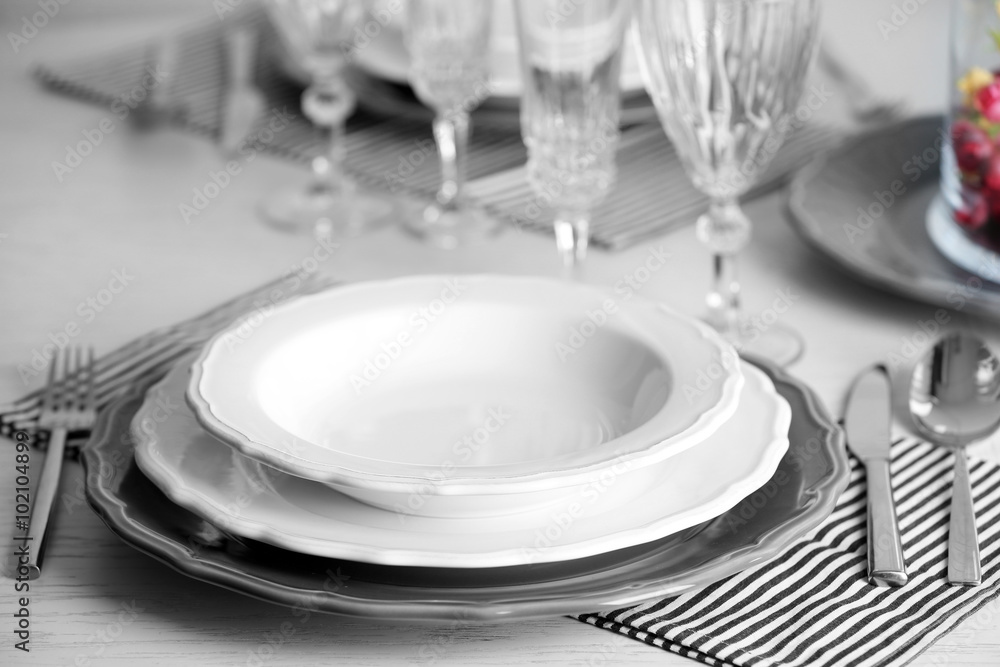 Table set at restaurant on light background Table set at restaurant on light background