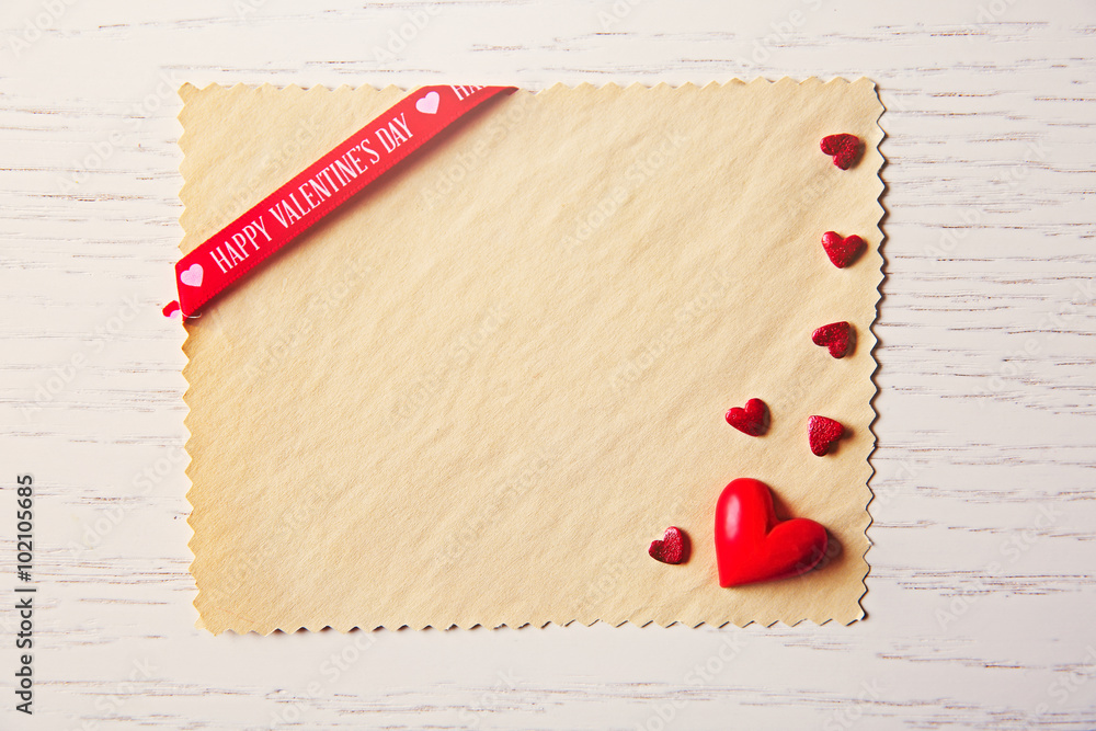 Blank present Valentine card on wooden background Blank present Valentine card on wooden background