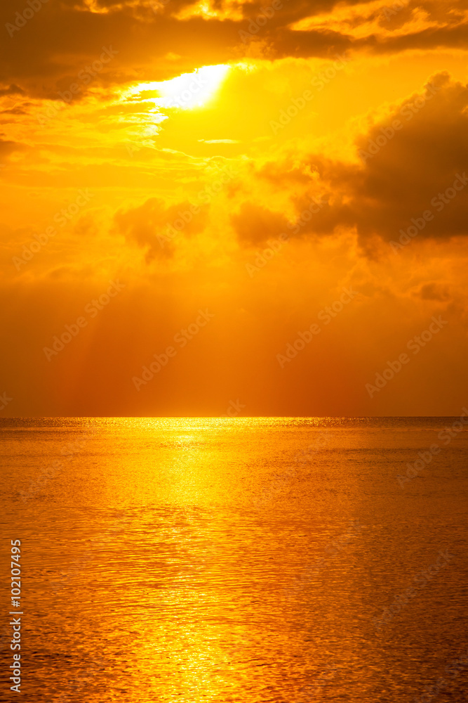 Stunning beautiful sunset. The sun falls into the sea