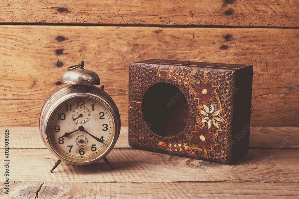Antique clock with carved wooden box Antique clock with carved wooden box