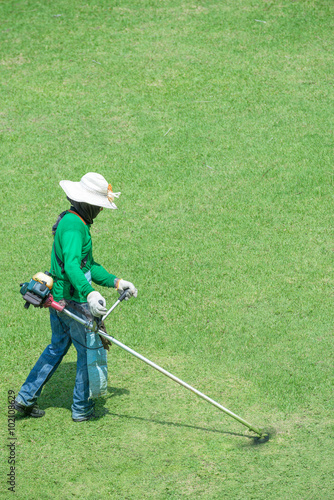 Man mowing grass