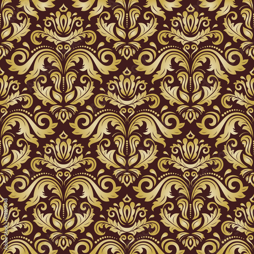 Seamless golden wallpaper in the style of baroque. Traditional vector pattern. Classic oriental background