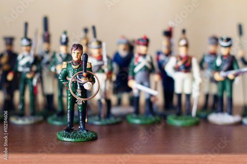 wedding rings and figures of soldiers