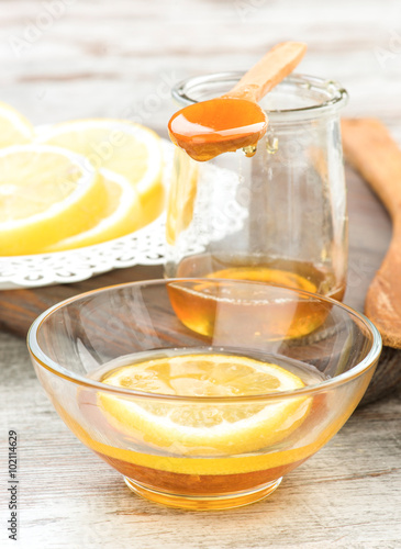 still life of honey and lemon