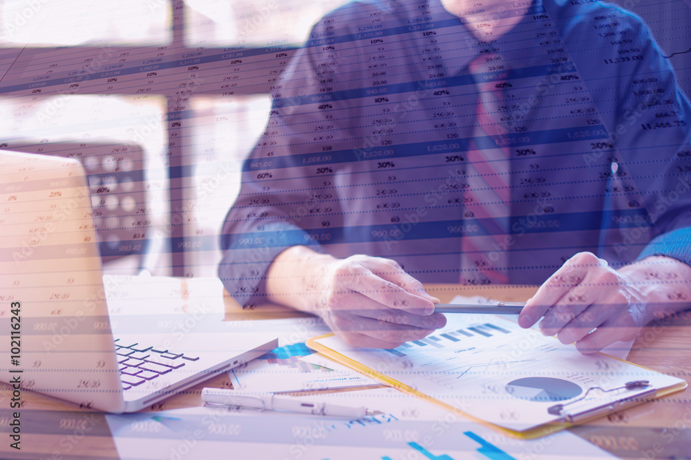 business documents on office table and graph business with socia business documents on office table and graph business with socia