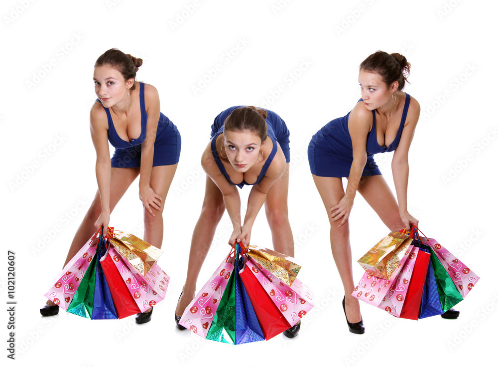 Happy young adult woman with colored bags Happy young adult woman with colored bags