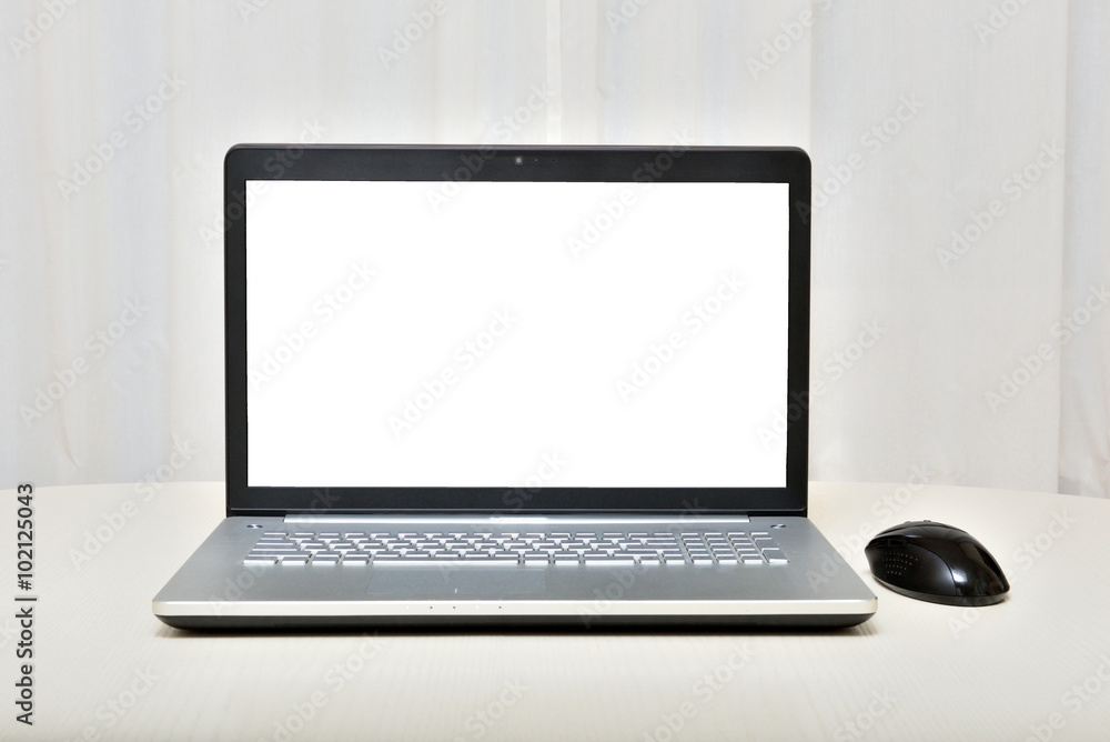 the laptop on a light background the laptop on a light background