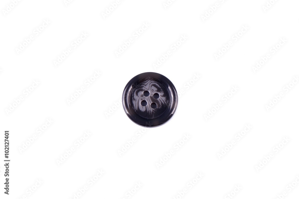 Detail of a colored button on white background Detail of a colored button on white background