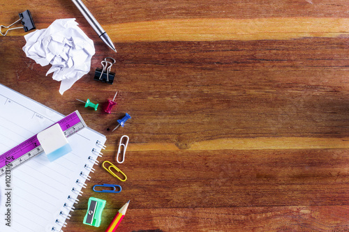 School or Office Supplies on Top of Wooden Table. Captured at Left Border Frame with Copy Space on the Right Side.