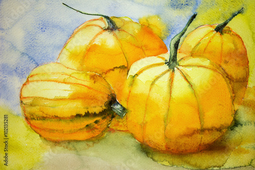 Four pumpkins. The dabbing technique gives a soft focus effect due to the altered surface roughness of the paper. photo