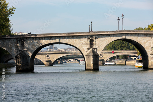 The Pont Neuf is the oldest standing bridge across the river Seine in Paris, France.