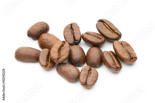 Coffee beans isolated on white background, closeup, macro