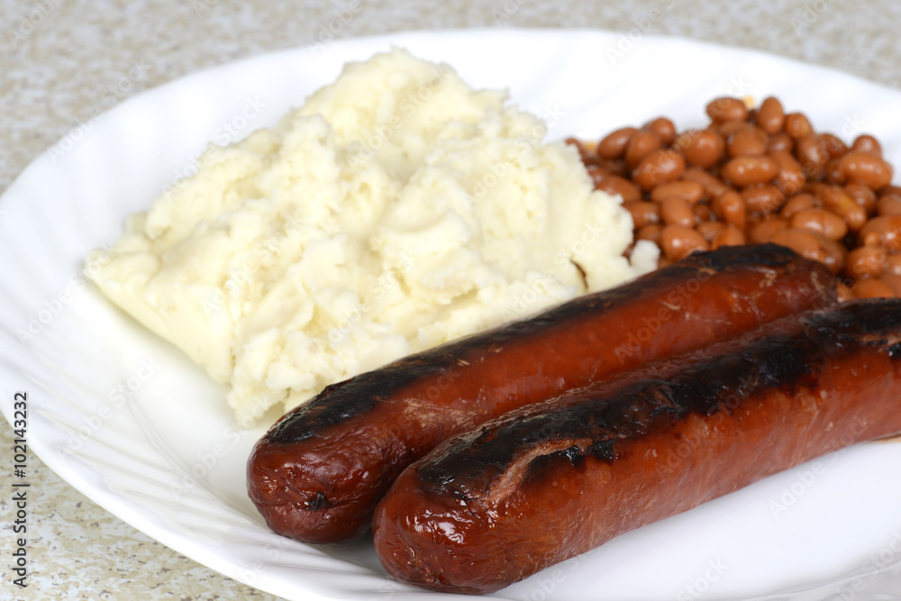 closeup sausages with mashed potatoes closeup sausages with mashed potatoes