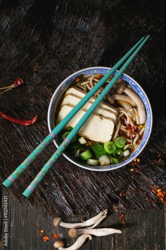 Fotografie Asian soup ramen with feta cheese
