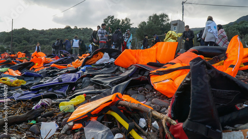 Abandoned belongings and life jackets on the Lesvos shore