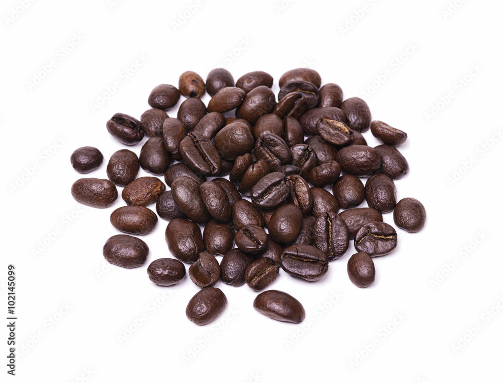 Small pile of roasted coffee beans isolated on white background Small pile of roasted coffee beans isolated on white background