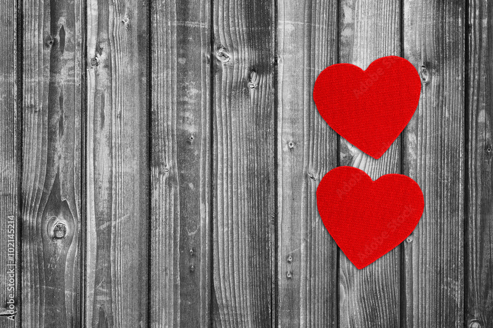 Two red hearts on wooden background with copy-space Two red hearts on wooden background with copy-space