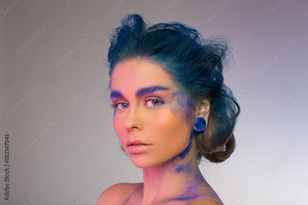 blue artistic make-up. studio on grey blue artistic make-up. studio on grey