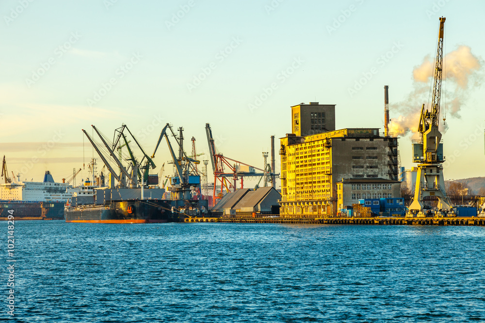 Cargo ship in the morning light on port of Gdansk, Poland.