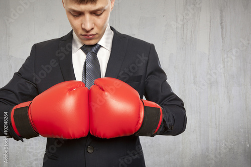 Businessman in red boxing gloves © Andrey Burmakin