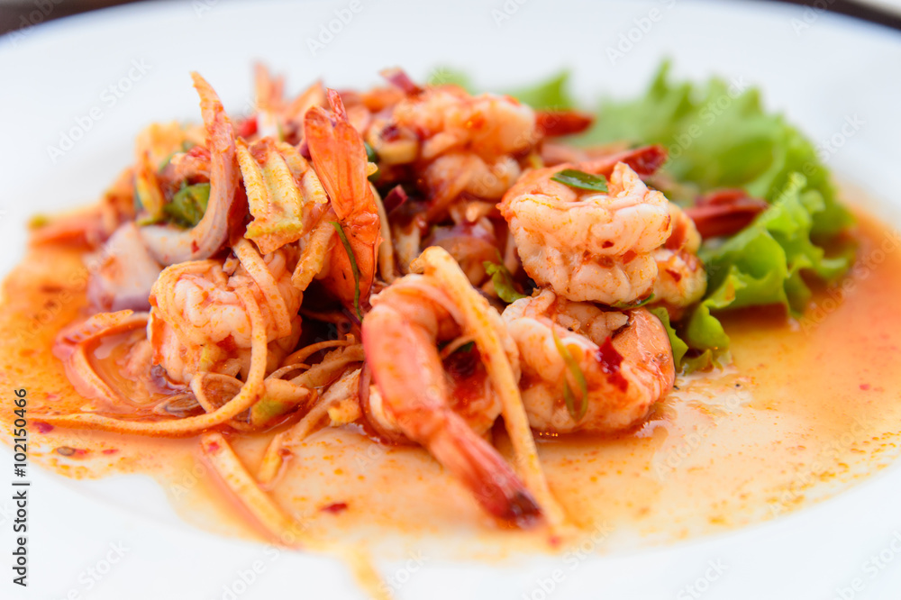 Thai food, shrimp ,with chili pepper and sweet basil Thai food, shrimp ,with chili pepper and sweet basil