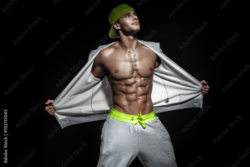 Athletic male model posing .