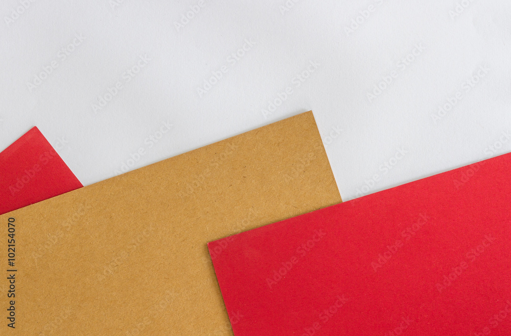 Red and brown paper on white paper background Red and brown paper on white paper background