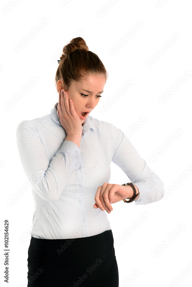 Young woman looking at her watch being late, Isolated on white background Young woman looking at her watch being late, Isolated on white background