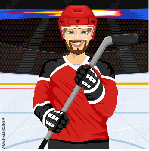 male ice hockey player with an ice hockey stick