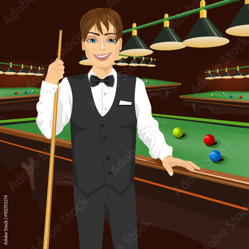 handsome man holding cue stick
