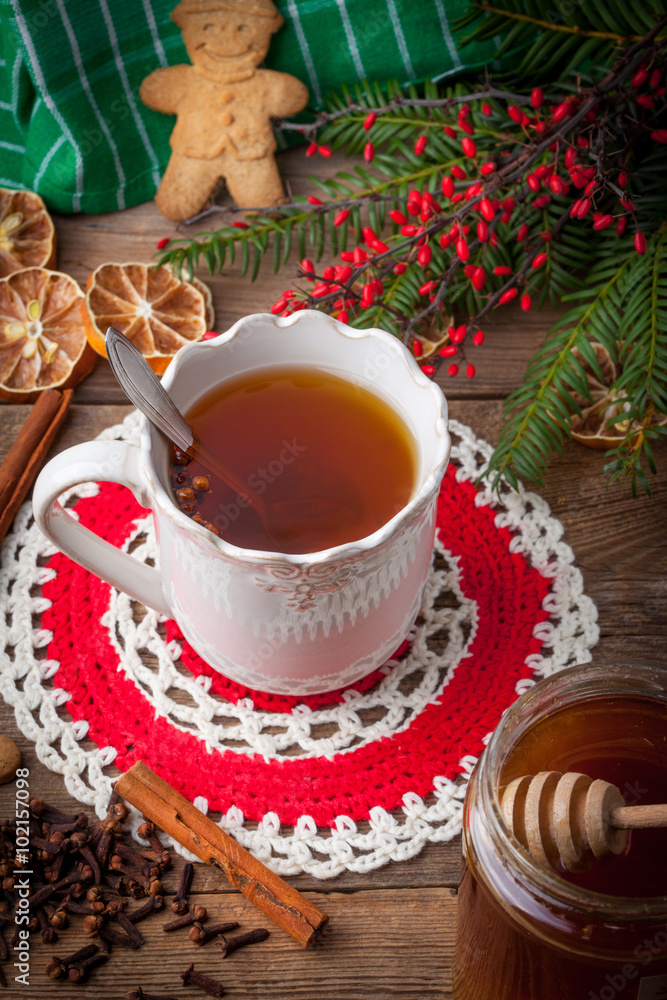 Winter hot drink with spices on wooden table. Winter hot drink with spices on wooden table.