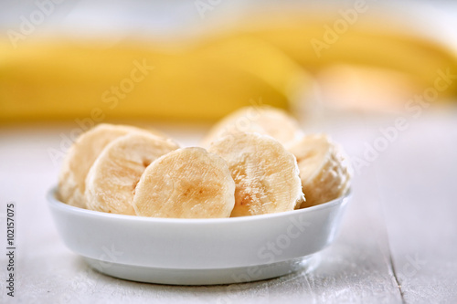 Fresh banana slices in bowl