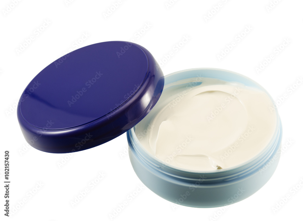 a container of cream bottle a container of cream bottle