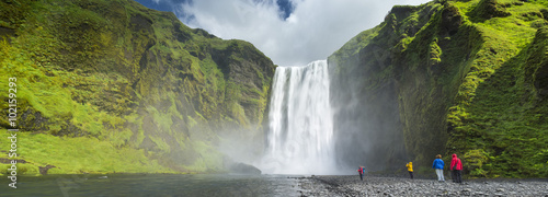 Fototapeta Naklejka Na Ścianę i Meble -  panorama with people and waterfall in Iceland