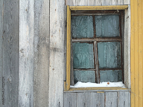 Vintage window on a wood wall