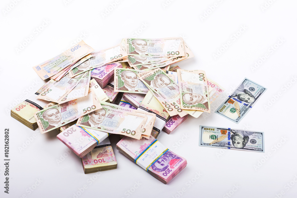 Ukrainian hryvnia and the US dollar.
Ukrainian hryvnia and the US dollar.