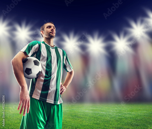 Football-player with a ball