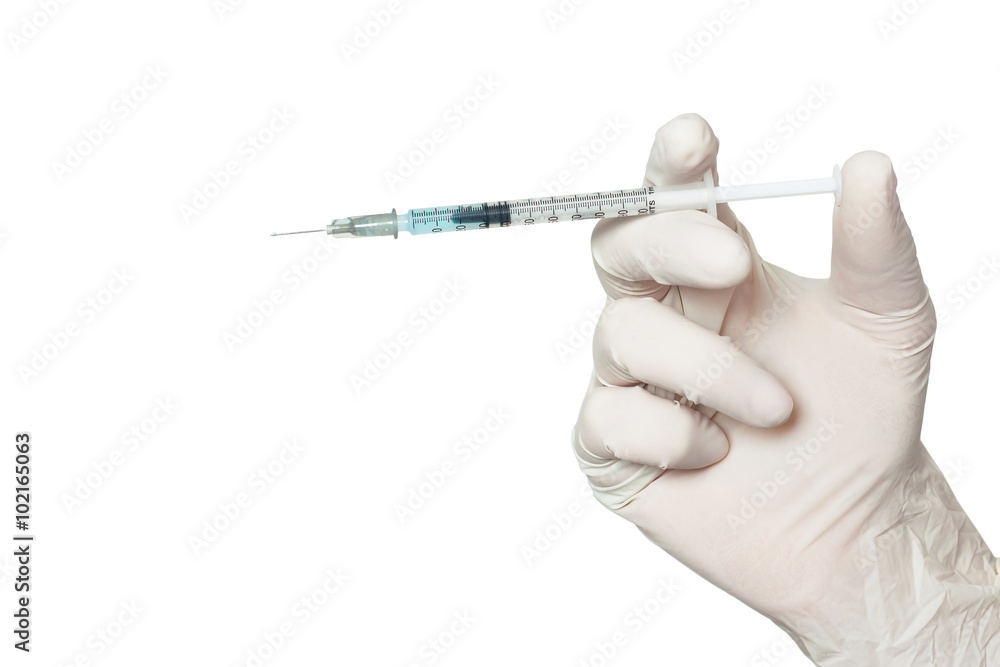 syringe in doctor hand syringe in doctor hand