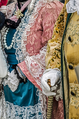 Detail view of a epoque costume at Venetian carnival 4 photo