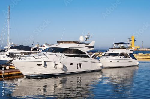 White yachts in the port © Ms VectorPlus