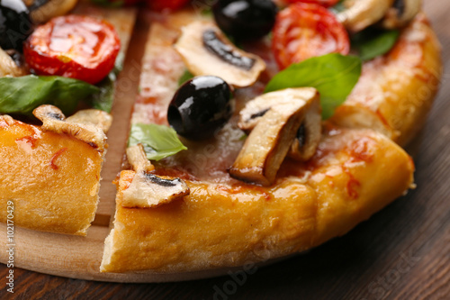 Sliced delicious tasty pizza  closeup