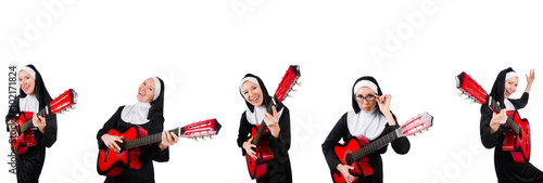 Nun with guitar isolated on white